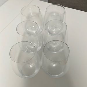 Set of six Reidel stemless wineglasses with inspirational quotes.